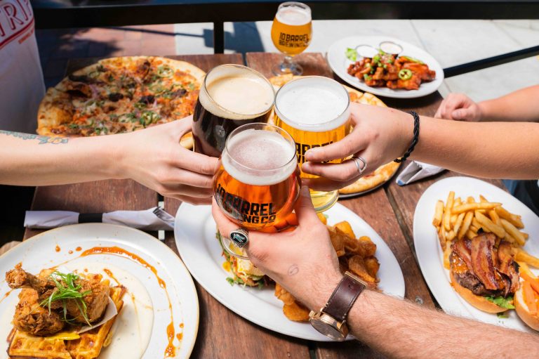 colorado restaurant with people toasting their beer glasses